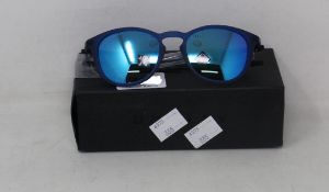 A boxed as new pair of Oakley Pitchman R glasses matte translucent blue frame with Prizm Sapphire