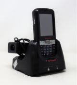 A pre-owned Honeywell Dolphin 60s Mobile Computer Barcode Scanner with cradle and power supply.