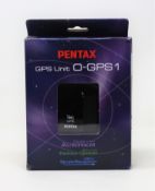 A boxed as new Pentax O-GPS1 Wireless GPS Unit (39012) (Some damage to box).