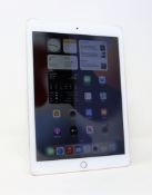 A pre-owned Apple iPad Air 2 (Wi-Fi/Cellular) 16GB in Gold (iCloud activation clear. Damage to
