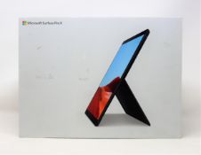 A pre-owned boxed Microsoft Surface Pro X with SQ1 processor, 8GB RAM and 128GB SSD in matt black (