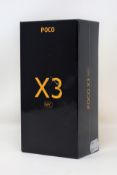 A boxed as new Xiaomi Poco X3 NFC 128GB Smartphone in Shadow Gray (UK plug adaptor required) (Box