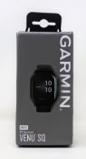 A boxed as new Garmin Venu SQ Music Edition GPS Smart Watch inn Black (Box opened).