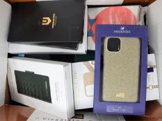 A box of assorted as new phone/tablet cases.