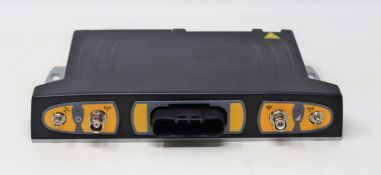 A pre-owned Trimble SNM941 Connected Site Gateway (M/N: SNM941-60 P/N: 104950-80) (Boxed, damaged