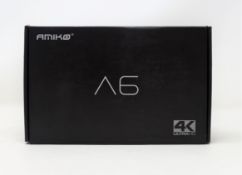A boxed as new Amiko A6 Android based OTT 4K IPTV Streaming Media Player (Box opened, EU plug