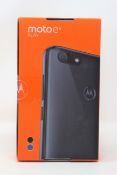 A boxed as new Motorola Moto E6 Play (XT2029-2 NL) 32GB in Steel Black (Box sealed. Two pin plug