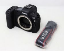 A pre-owned Canon EOS R 30.3 MP Mirrorless Digital Camera Body (Canon Strap included. No battery,