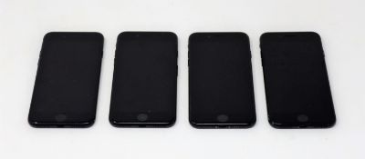 Four pre-owned Apple iPhone 7 (A1778) in Space Grey (iCloud activation clear. Some cosmetic damage