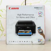 A boxed as new Canon PIXMA TS705 multi-function inkjet printer in black (box opened) (box damaged).