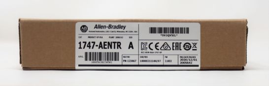 A boxed as new Allen-Bradley Ethernet IP Adapter Module (CAT: 1747-AENTR A FW 2.002) (Box sealed).