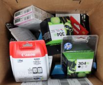 A box of assorted as new printer ink/toner cartridges.