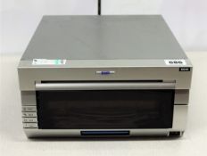 COLLECTION ONLY: A pre-owned DNP DS40 photo printer.