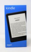 A boxed as new Amazon Kindle 6