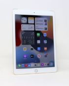 A pre-owned Apple iPad Air 2 (Wi-Fi/Cellular) 16GB in Gold (iCloud activation clear. Checkmend