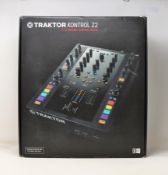 A boxed as new Native Instruments Traktor Kontrol Z2 DJ Mixer and Controller (Box sealed).