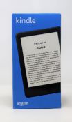A boxed as new Amazon Kindle 6