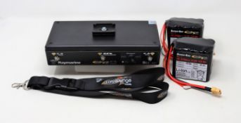 A pre-owned Carplounge Raymarine 2.4Ghz GPS Autopilot Transmitter Box with power supply, UK plug