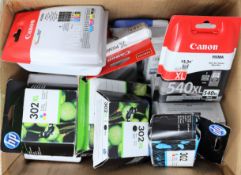 A box of assorted as new printer ink/toner cartridges.