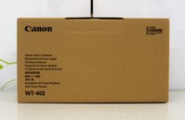 Four boxed as new Canon WT-402 waste toner containers.