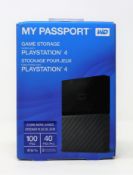A boxed as new WD 4TB My Passport Portable Gaming Storage for PlayStation 4 in Black (Box sealed).
