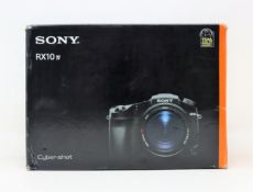 A boxed as new Sony Cyber-shot DSC-RX10 IV Digital Camera (Box sealed).
