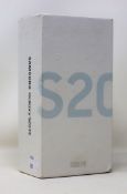 A boxed as new Samsung Galaxy S20 FE SM-G780F/DS 128GB in Cloud White (Box opened, UK plug included)