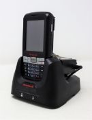 A pre-owned Honeywell Dolphin 60s Mobile Computer Barcode Scanner with cradle and power supply.