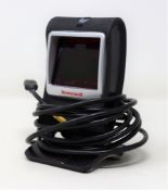 A pre-owned Honeywell Genesis 7580G-2 1D 2D USB Presentation Barcode Scanner.