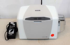 A pre-owned HID Fargo C50 ID Card Printer with power supply (P/N: X001800-1) (Tested, working.