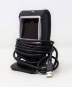 A pre-owned Honeywell Genesis 7580G-2 1D 2D USB Presentation Barcode Scanner.
