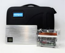 A pre-owned miniPCR thermal cycler for labs and classrooms with 20000mAh miniPCR power pack and