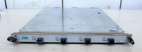 COLLECTION ONLY: A pre-owned Juniper DPCE-R-4XGE-XFP 4x10GE Enhanced DPC Module with transiver