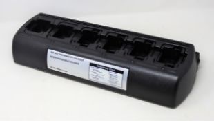 A boxed as new unbranded six way trichemistry charger with interchangeable holders in black (PN: