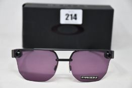 Two boxed as new Oakley Chrystl matte black frame with prizm indigo lenses (888392427021).