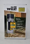 A boxed as new Kamp Wile 55 grain moisture meter.
