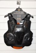 An as new Fox Raceframe Impact SB CE D30 Protector Vest in black (L/XL).