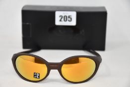 A boxed as new pair of Oakley Eyejacket Redux sunglasses corten frame with Prizm 24k Polarized