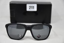 Two boxed as new Oakley Anorak sunglasses matte black frame with prizm black polarized lenses (