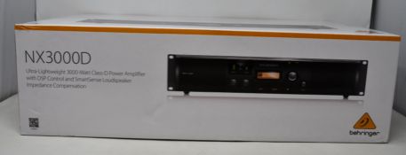 A boxed as new Behringer NX3000D Ultra-Lightweight 3000-Watt Class-D Power Amplifier.