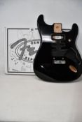 An as new Genuine Fender Replacements Deluxe Stratocaster Alder body in Black.