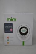 A boxed as new Mira Fertility Plus starter Kit EVA3000 (includes 1 digital analyser and ten test