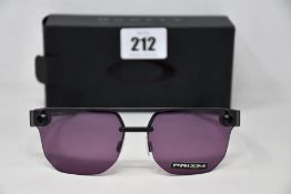 Two boxed as new Oakley Chrystl matte black frame with prizm indigo lenses (888392427021).