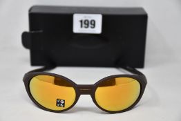A boxed as new pair of Oakley Eyejacket Redux sunglasses corten frame with Prizm 24k Polarized