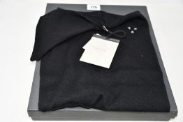 A women's as new Nemozena short sleeve turtle neck sweater in black (M).