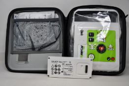 A boxed as new Ami Italia Smarty Saver - Fully Automatic Defibrillator (SM2-B1002).