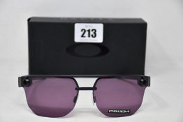 Two boxed as new Oakley Chrystl matte black frame with prizm indigo lenses (888392427021).