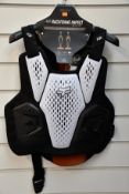 An as new Fox Raceframe Impact SB CE D30 Protector Vest in black/White (L/XL).