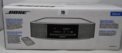 A boxed as new Bose Wave music system IV.