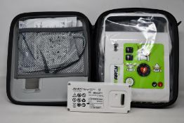 A boxed as new Ami Italia Smarty Saver - Fully Automatic Defibrillator (SM2-B1002).
